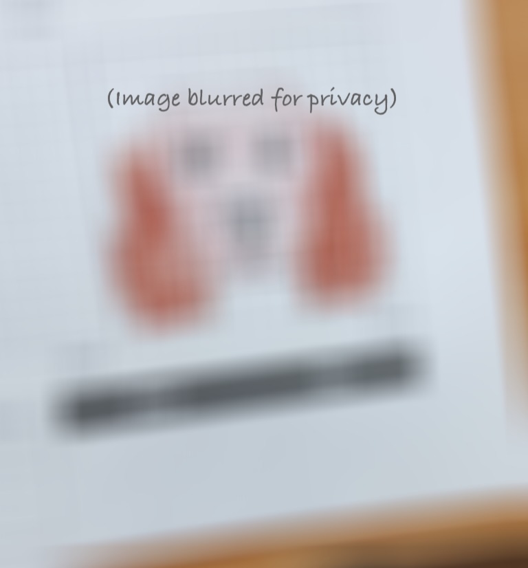 Student's pixel art dog face design for a keyring